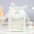 White laser-cut wedding favor box with pearl paper and a white organza ribbon bow - Ivory