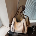 Creamy leather shoulder bag with brown contrast handles and stylish zipper tassels - Off White