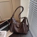 Dark brown faux leather multi-zipper backpack with fringe pulls for women's daily commute - Brown