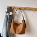 Brown suede hobo shoulder bag with adjustable strap in a casual lifestyle setting - Brown (Without Pendant)