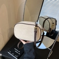 Retro frosted cream crossbody bag with brown trim shown in an elegant mirror reflection - Khaki with Coffee