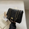 Classic black quilted shoulder bag with gold chain strap and metal turn-lock closure - Black