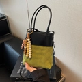 Olive green bucket bag in suede and black leather with beaded fringe charm - Green (With Wooden Bead Pendant)