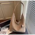 Minimalist beige oversized tote bag in crackled faux leather with decorative charm - Khaki