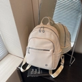 Mochila elegante color crema de cuero sintético granulado con diseño de cremalleras - Blanco Roto