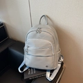 Premium hellgrauer Rucksack aus genarbtem Leder mit Reißverschluss für modisches Pendeln - Blau