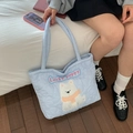 Light blue quilted tote bag with heart pattern and white puppy embroidery detail - Blue Dog