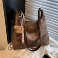 Brown vintage leather hobo bag with contrast stitching and teddy bear charm - With Charm / Brown