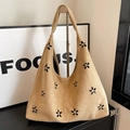Khaki suede tote bag with laser-cut floral pattern and a wide shoulder strap style - Khaki