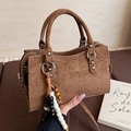 Brown suede minimalist crossbody bag with decorative bead tassel and silver studs - Brown with Pendant
