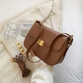 Minimalist brown leather crossbody bag featuring a sleek golden rectangular clasp - Khaki