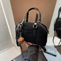 Black Boston bag in suede and patent leather with a brown baseball glove charm - With Charm / Black