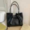 Minimalist black large capacity tote bag with leather texture and slim shoulder straps - Black