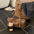 Vintage brown leather Boston bag with plush bear charm and adjustable shoulder straps - Brown with Pendant