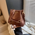 Retro dark brown leather bucket bag with gold chain and adjustable shoulder strap - Brown