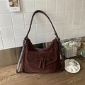 Retro dark coffee suede hobo shoulder bag featuring a decorative bow and front flap pocket - Burgundy