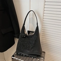 Matte black oversized suede hobo bag with knotted strap on silver luggage - Black