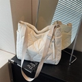 Quilted white nylon tote bag with adjustable wide strap and side zipper pocket - Off White