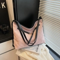 Pink quilted suede backpack with slim black straps and golden metal hardware details - Pink
