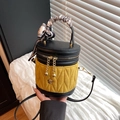 Quilted yellow suede bucket bag with black leather trim and silk scarf handle - Yellow