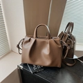 Dark brown textured leather tote bag with elegant draped design and top handles - Brown