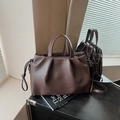 Pleated dark brown leather tote bag with top handles and adjustable shoulder strap - Brown