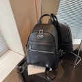 Minimalist black pebble leather backpack with silver zippers and large capacity - Black