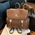 Mochila vintage de cuero marrón con cierre de giro dorado y correas de hombro ajustables - Marrón