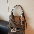 Large leopard print hobo bag with brown leather flap and adjustable shoulder strap - Green with Pendant