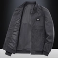 Dark grey corduroy bomber jacket for men featuring a ribbed collar and chest logo patch - M / Gray Jacket