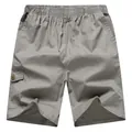 Men's relaxed fit cotton cargo shorts in taupe with elastic waist and side flap pockets - XL / Light Gray