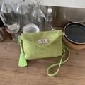 Avocado green frosted leather crossbody bag with silver twist lock and suede texture - Green