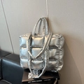 Quilted silver puffer tote bag in metallic finish with double handle for shoulder carry - Silver