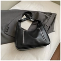 Minimalist black PU leather tote bag with silver zippers styled on a gray blazer - Black without Pendant