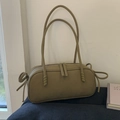Olive green matte shoulder bag with long handles and decorative side ribbons - Elm Green