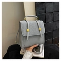 Detail of blue-grey vintage faux leather backpack with gold buckles and top handle - One Size / Silver