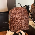 Chic leopard print backpack with premium metal zippers and black leather straps - Brown