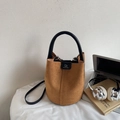 Dark brown frosted suede bucket bag with black top handles and a thin shoulder strap - Brown No Pendant
