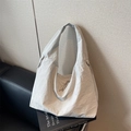 Light gray nylon hobo tote bag with multiple zipper pockets and wrinkled texture - Off White