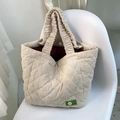 Beige quilted corduroy tote bag with ruffled handles and a green MISU brand label - Beige