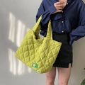 Vibrant lime green quilted tote bag featuring a diamond stitch pattern and ruched handle - Avocado Green