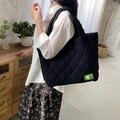 Chic black quilted tote bag with soft diamond stitching and minimalist MISU label - Black