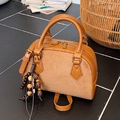 Sac oreiller marron en daim et cuir avec pompon décoratif en perles de bois - Marron (Avec Pendentif)