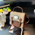 Sac bandoulière vintage en toile kaki et cuir marron avec boucle de style rétro - Kaki