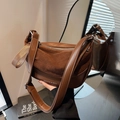 Retro brown saddle bag in matte leather and suede with wide strap and mirror view - Brown
