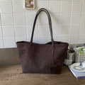 Deep brown matte tote bag with slim shoulder straps and water drop charm detail - Brown