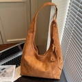 Vintage brown suede tote bag featuring adjustable side drawstrings and large capacity - Brown
