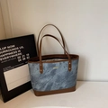 Blue marble texture tote bag with brown leather handles and gold rivet accents - Blue Without Charm
