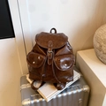 Mochila vintage de cuero sintético marrón oscuro con solapa de hebilla y bolsillos - Marrón