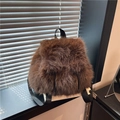 Plush faux fur backpack in dark brown with adjustable straps and soft texture - Brown